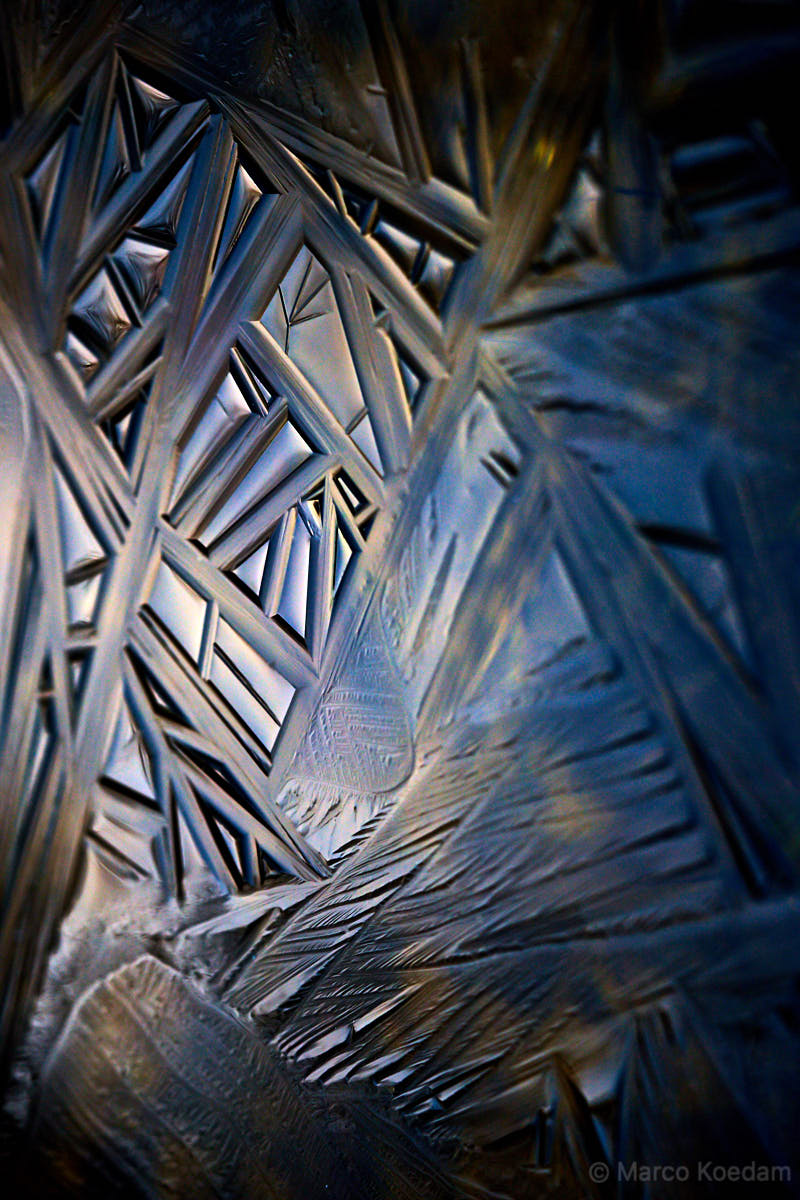 Macro-opname van geometrische en willekeurige vormen en patronen in ijs